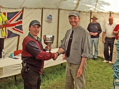 Matt Curran receives Best Club Stand award from the show organisers